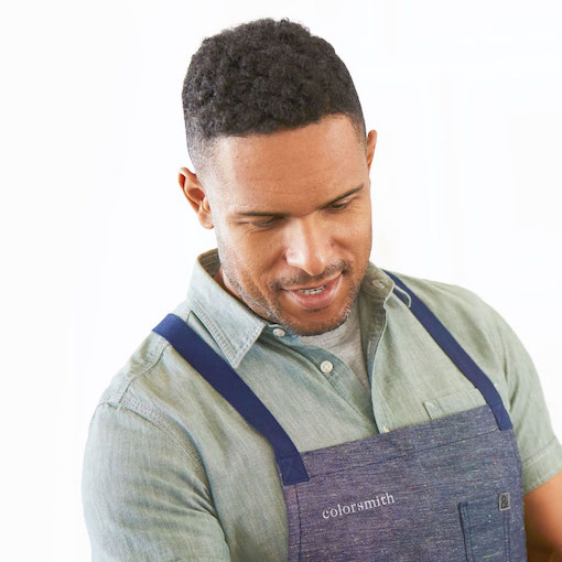 Expert colorist examining hair color